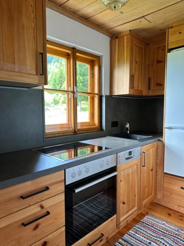 Una cocina o zona de cocina en Ferienhaus Moosstadel