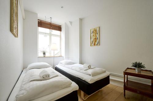 Postel nebo postele na pokoji v ubytování ApartmentInCopenhagen Apartment 1556