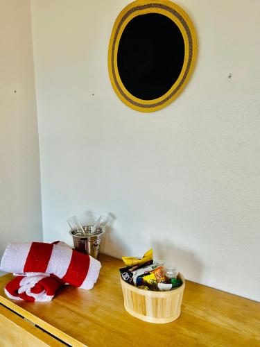 a wooden table with a stuffed animal on top of it at Exclusive Altos del Maria 2 Bedroom Apartment-Private Pool & Mountain Views in Sorá