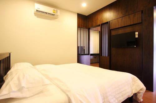 Postel nebo postele na pokoji v ubytování Rongsang Resort