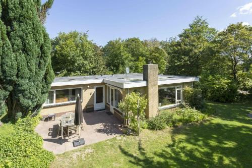 an aerial view of a house with a garden at Poldersbos 7 - Ouddorp in Ouddorp