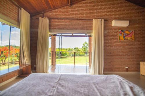 Postel nebo postele na pokoji v ubytování Recanto de Lazer c/ Piscina, Bar molhado e Sinuca
