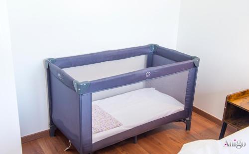a blue bunk bed with a white mattress at Bunska Venera in Blagaj
