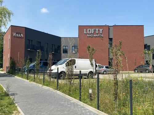 Fotografie z fotogalerie ubytování LOFTY NAD WARTĄ Apartament FREE PARKING v Poznani