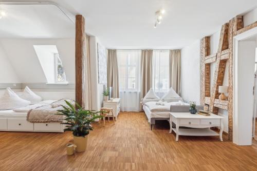 Postel nebo postele na pokoji v ubytování Loft über den Dächern Coburgs, Parkplatz