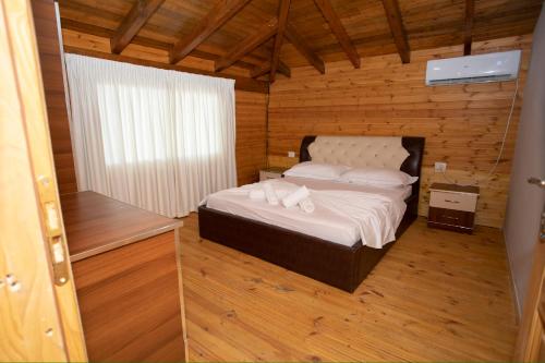 Postel nebo postele na pokoji v ubytování Calme Beach