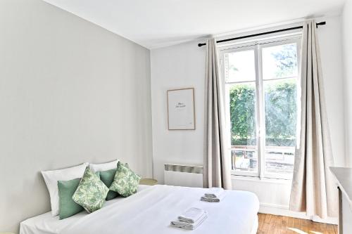 Postel nebo postele na pokoji v ubytování Appartement Spacieux et paisible Magnifique Vue