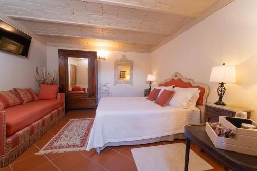 Postel nebo postele na pokoji v ubytování Agriturismo Torreghiotta