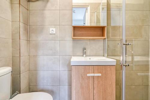 Ένα μπάνιο στο Maison au calme pour 4 pers avec parking a 5 min du métro L7