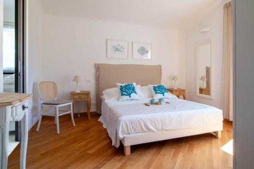 Postel nebo postele na pokoji v ubytování Ermes by PortofinoHomes