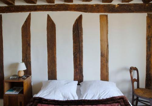 Ένα ή περισσότερα κρεβάτια σε δωμάτιο στο Nest in Paris