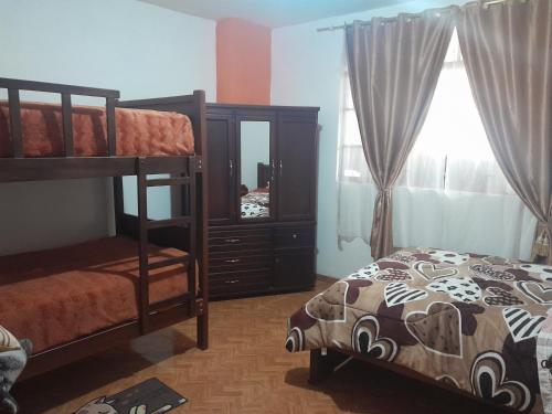 Postel nebo postele na pokoji v ubytování SANPE Apartment