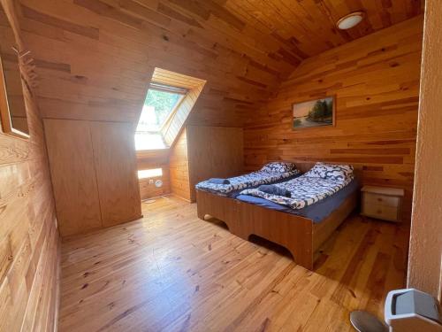 Postel nebo postele na pokoji v ubytování Stropu Resort