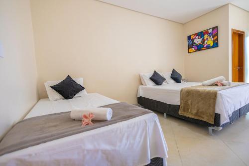 Postel nebo postele na pokoji v ubytování Rancho paradisíaco c/ 7 suítes no Lago das Brisas