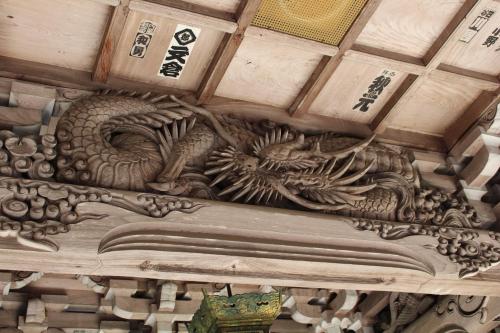 a dragon carving on the ceiling of a building at Miyajima Seaside Hotel in Miyajima