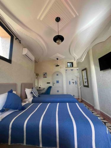 Cama o camas de una habitación en Jnane Ayam Atlas