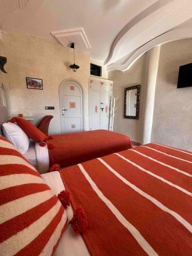 Cama o camas de una habitación en Jnane Ayam Atlas
