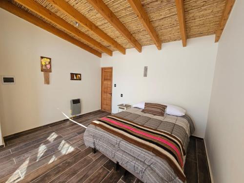 Postel nebo postele na pokoji v ubytování Hotel Pirwa
