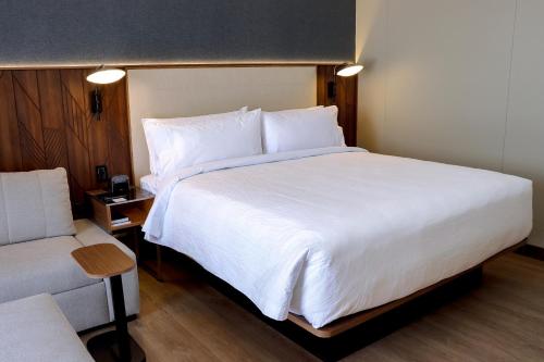 Courtyard by Marriott Puebla Las Animasにあるベッド