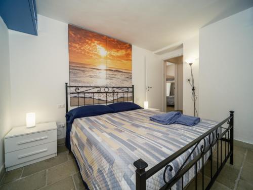 Cama ou camas em um quarto em LA FINESTRA SUL MARE - Antonella Apartment