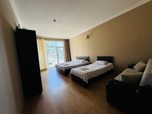 Postel nebo postele na pokoji v ubytování Black Sea Hotel