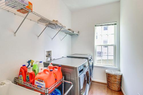 a kitchen with a dishwasher and a dish washer at Spacious Accokeek Home Near MGM, Alexandria and DC! in Accokeek