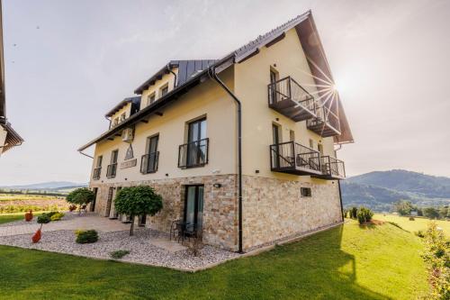 an external view of a villa in a vineyard at HP APARTMÁNY SKIAREÁL- Buková Hora v Orlických horách 100 m od lanovky in Červená Voda