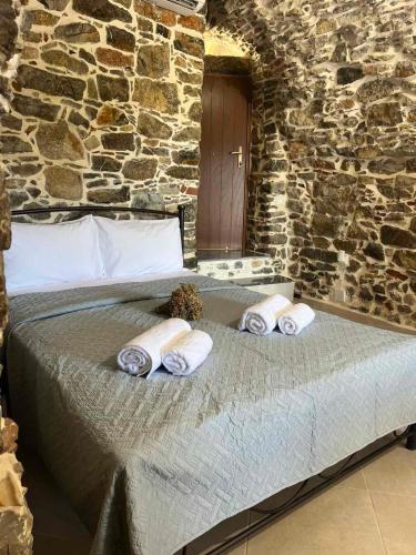 Vlychos Olympi Lodges - Chios Cozy Getawaysにあるベッド