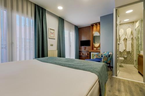 Sometimes Hotel Taksimにあるベッド