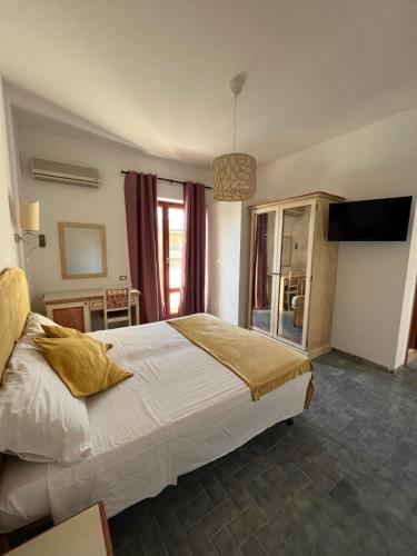 Postel nebo postele na pokoji v ubytování TC HOTEL