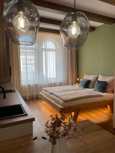 Postel nebo postele na pokoji v ubytování Golden Key Apartments