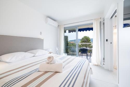 Postel nebo postele na pokoji v ubytování FEEL HOME - GRASSEUIL