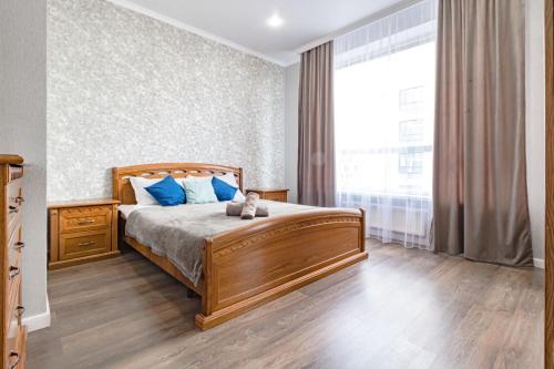 Ένα ή περισσότερα κρεβάτια σε δωμάτιο στο Apartment in the Heart of the Capital