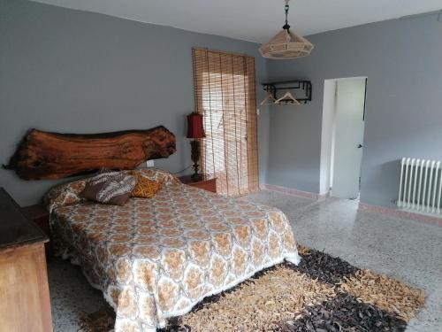 Ένα ή περισσότερα κρεβάτια σε δωμάτιο στο Casa Cándida