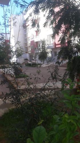 a large building in the middle of a street at Marina dore in Sidi Yahia az Zaʼer