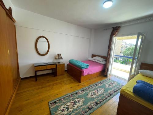 Katil atau katil-katil dalam bilik di Cairo Pulse Luxury Apartment in 6th October