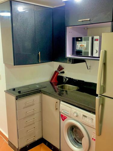 Kuchyň nebo kuchyňský kout v ubytování بورتو مارينا