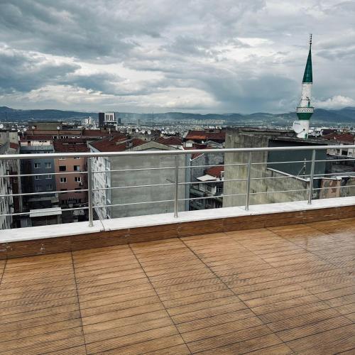 a balcony with a view of a city at Bursa Malkoc Hotel in Bursa