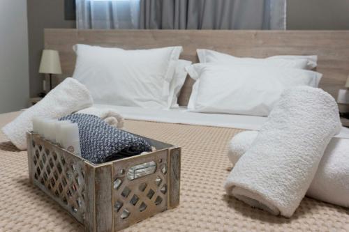 Ένα ή περισσότερα κρεβάτια σε δωμάτιο στο Zathay Apartments