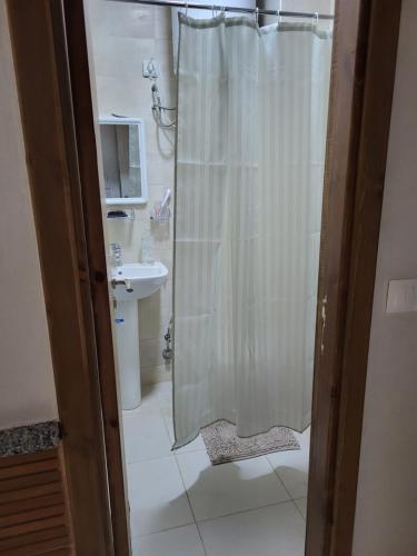 Koupelna v ubytování Appartement lumineux avec piscine