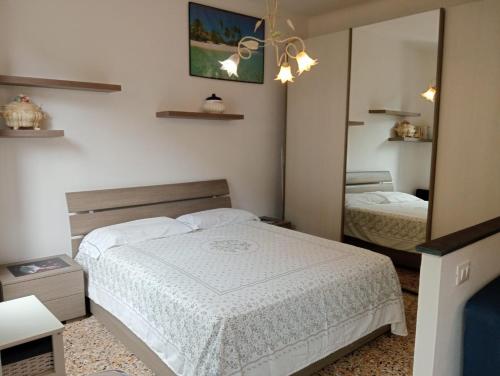 Postel nebo postele na pokoji v ubytování Casa Luigi