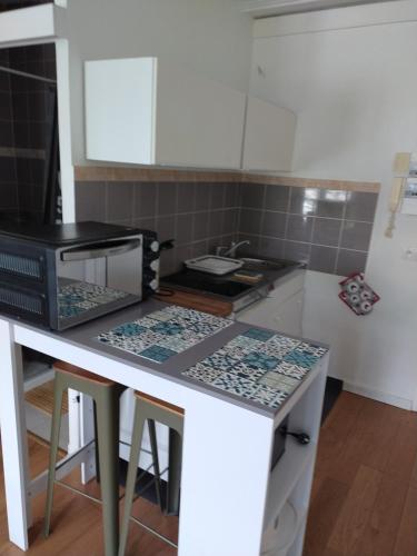 Afbeelding uit fotogalerij van Studio Pont de Sèvres bien situé in Sèvres