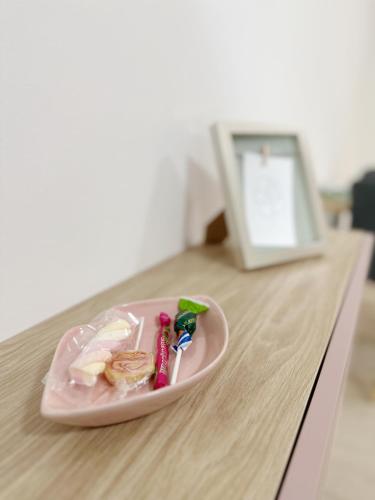 a plate of food sitting on a table at DMR APARTMENTS Rosie in Košice