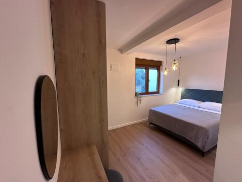 Katil atau katil-katil dalam bilik di APARTMANI 4 PALME