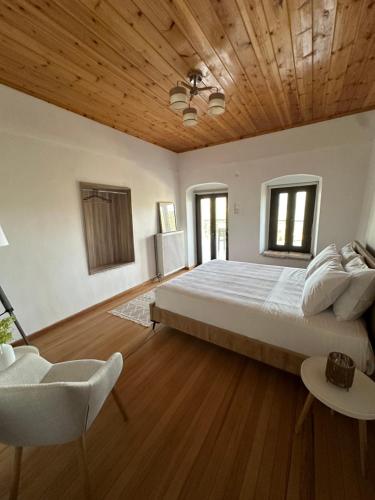 Ένα ή περισσότερα κρεβάτια σε δωμάτιο στο Villagio Arcadia
