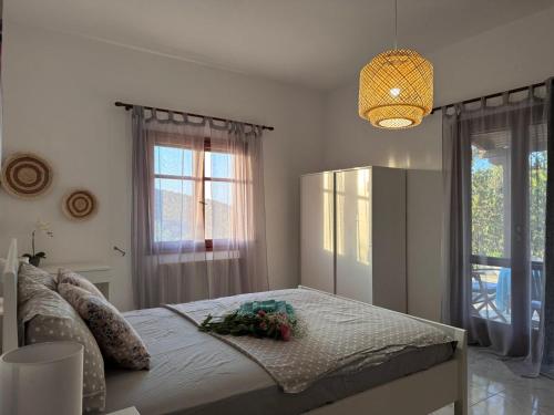 Postel nebo postele na pokoji v ubytování Fousa Home