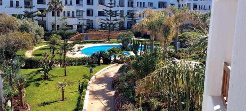 an aerial view of a resort with a swimming pool at Appartement Marina Beach, Mdiq in M'diq