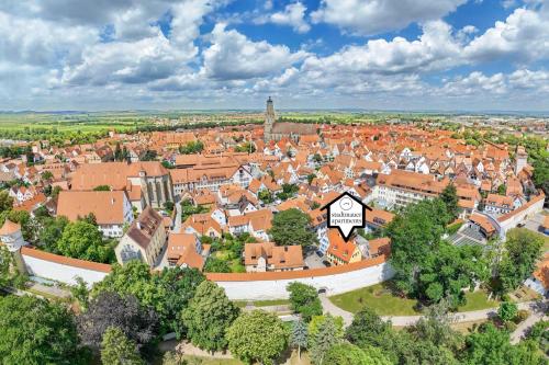 an aerial view of a town with a sign at stadtmauer apartments - Großzügige luxuriöse Wohnung an der Stadtmauer - ideal für Familien in Nördlingen