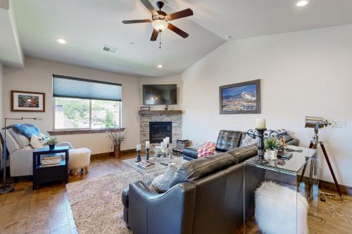 a living room with a couch and a fireplace at Black Rock Ridge - Unit L in Heber City