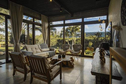 Χώρος καθιστικού στο Refúgio charmoso cercada por verde